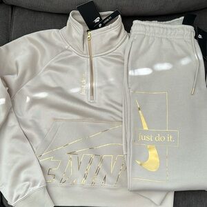 Nike Sweatsuit-women's Size S, color Ivory and gold. NWT.